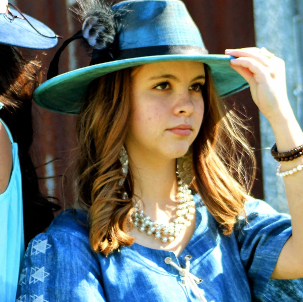 Genuine Leather Oval Earrings in Gilded Cowboy with Matte Accent - Image 2