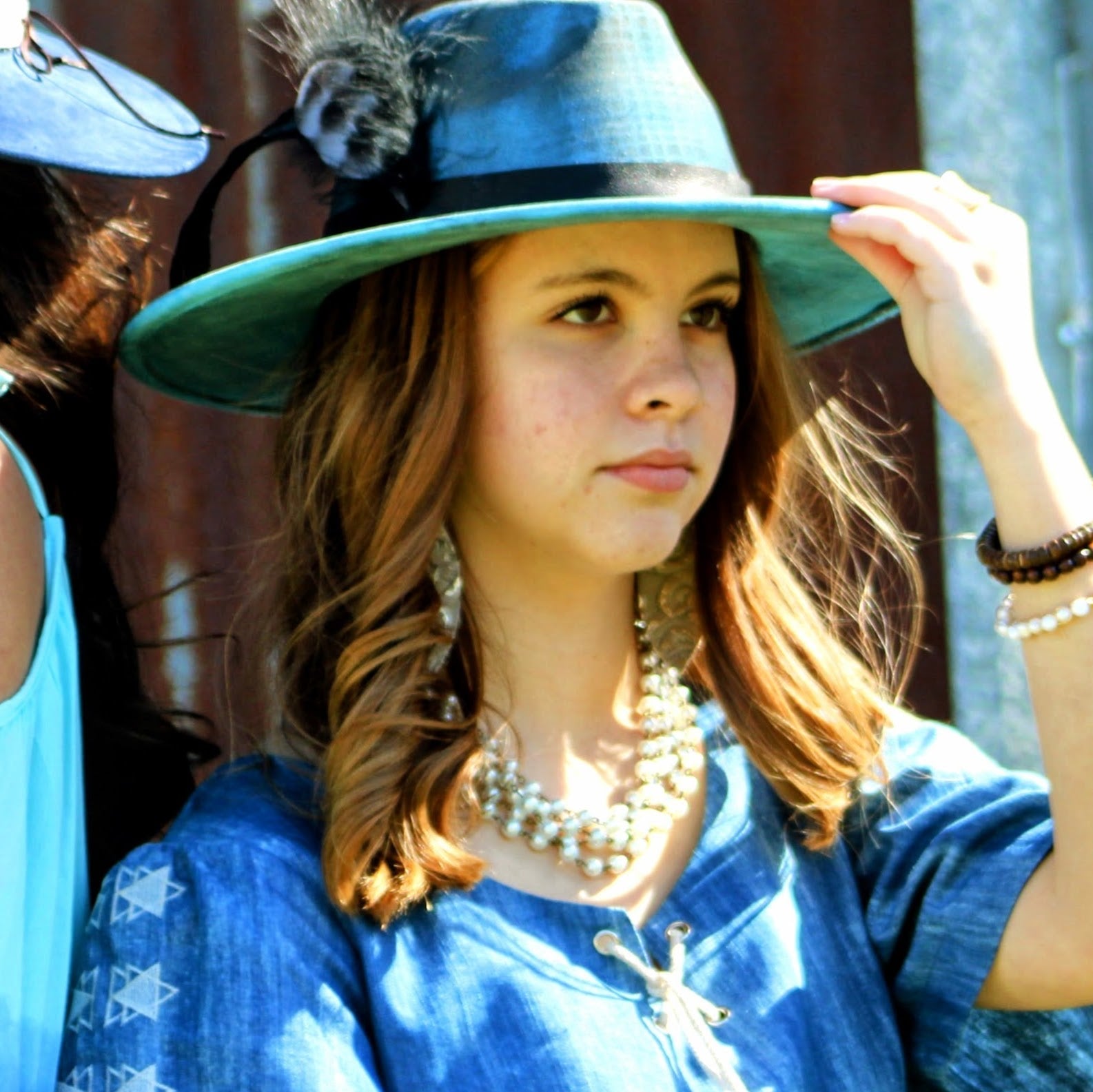Genuine Leather Oval Earrings in Gilded Cowboy with Matte Accent - Image 2