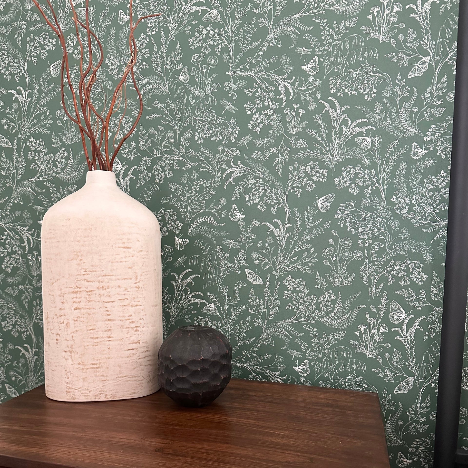 Bronwyn wallpaper by Anna Black Creative featuring a botanical print on a wall.