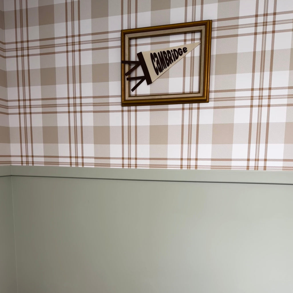 Archer plaid wallpaper in beige and cream on a clean minimalist wall