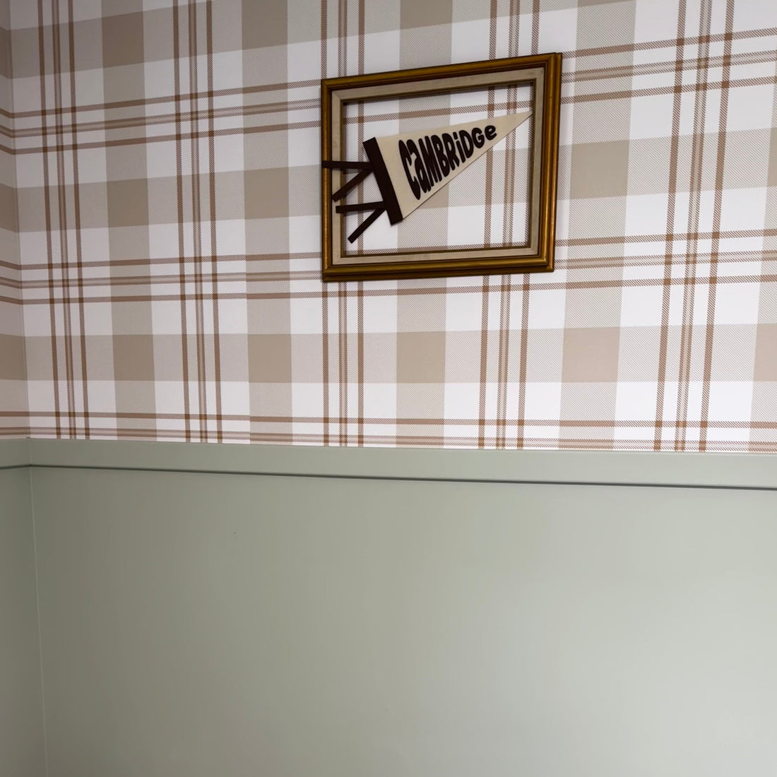 Archer plaid wallpaper in beige and cream on a clean minimalist wall
