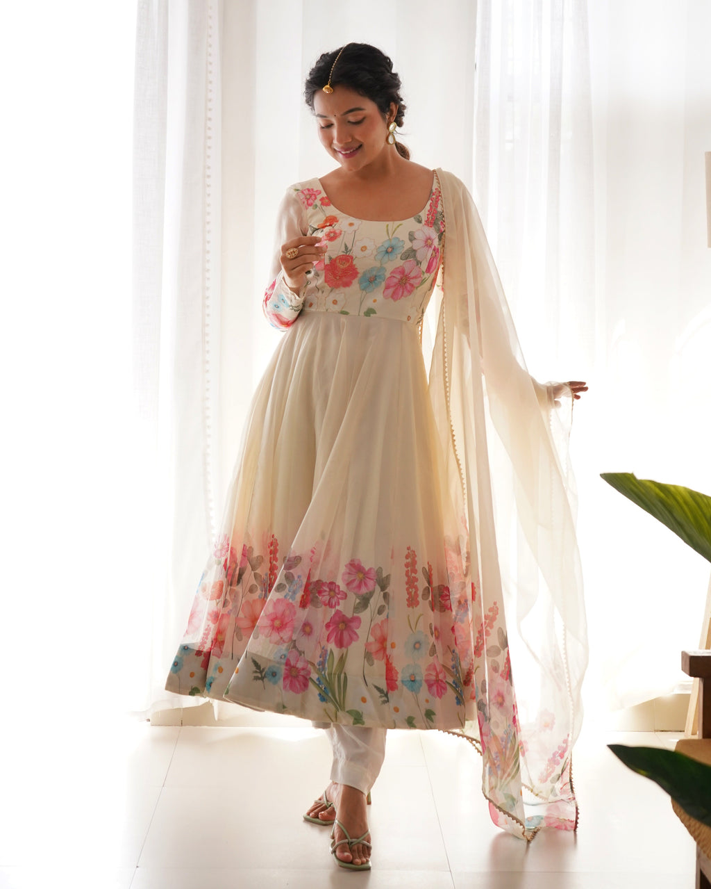 Sophisticated cream organza silk Anarkali set with floral print and detailed Badla Jari embroidery