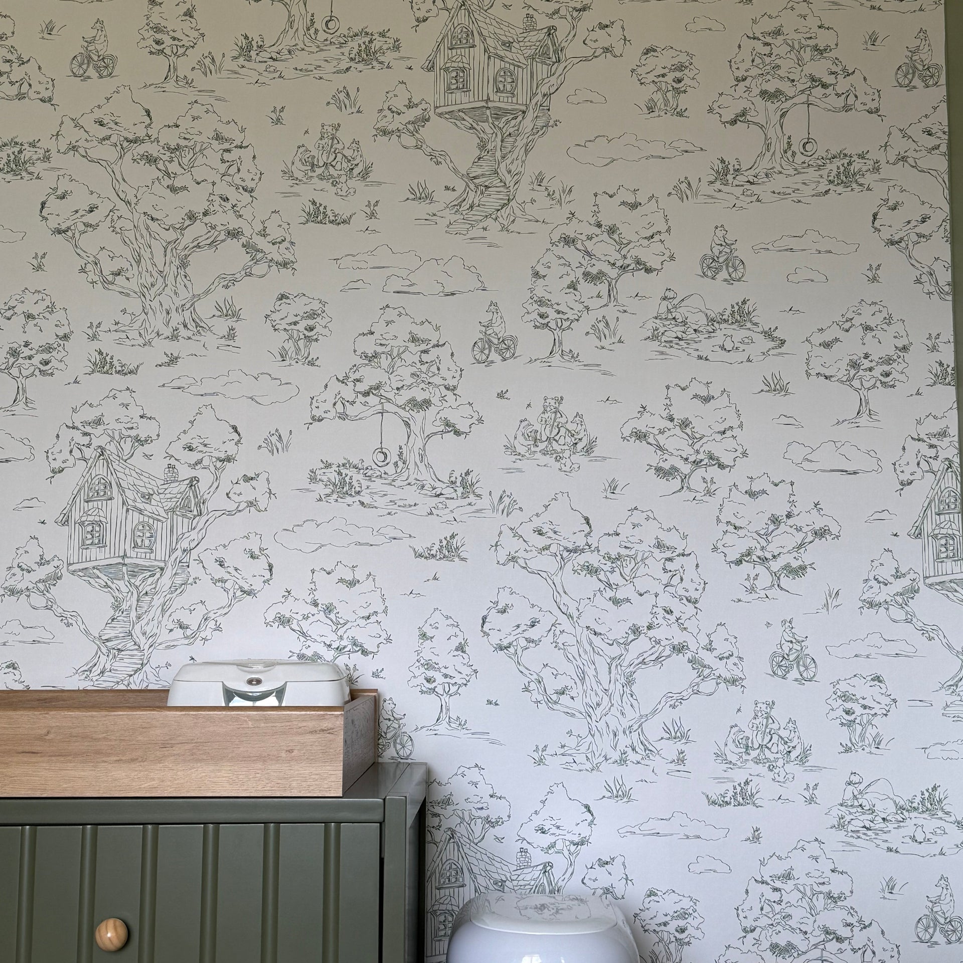 Wyatt whimsical wallpaper for nurseries featuring blue, pink, and white colors.