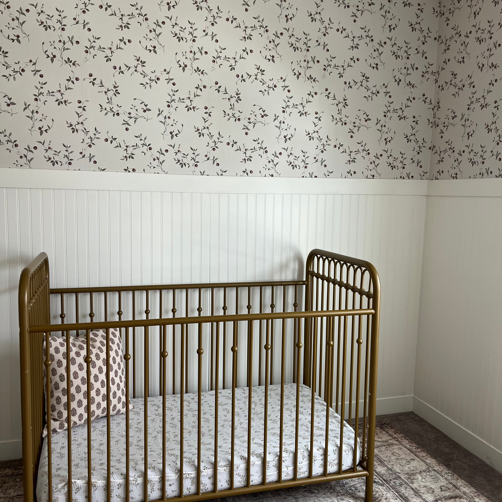 Cottagecore floral wallpaper in sage-green, cream, and muted-red