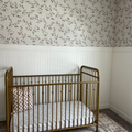 Cottagecore floral wallpaper in sage-green, cream, and muted-red