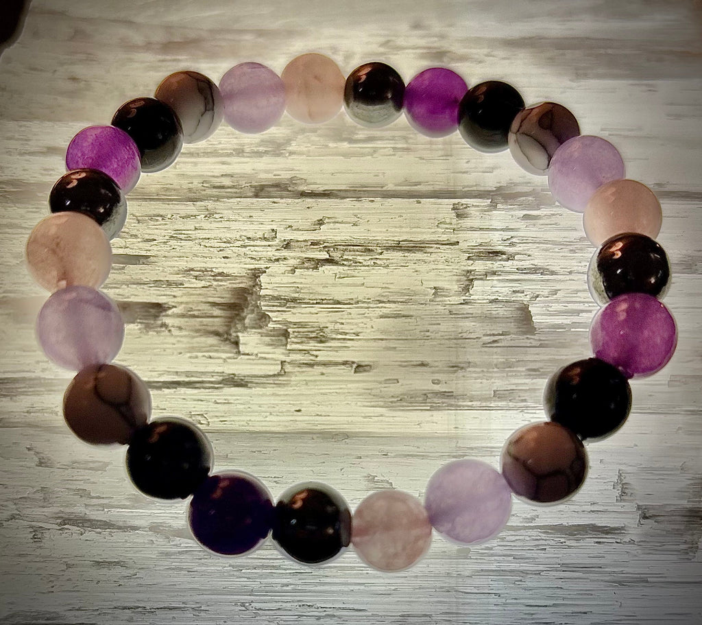 The Empaths Recharge Bracelet (amethyst, Clear Quartz, Rose Quartz, White Howlite, Black Tourmaline)