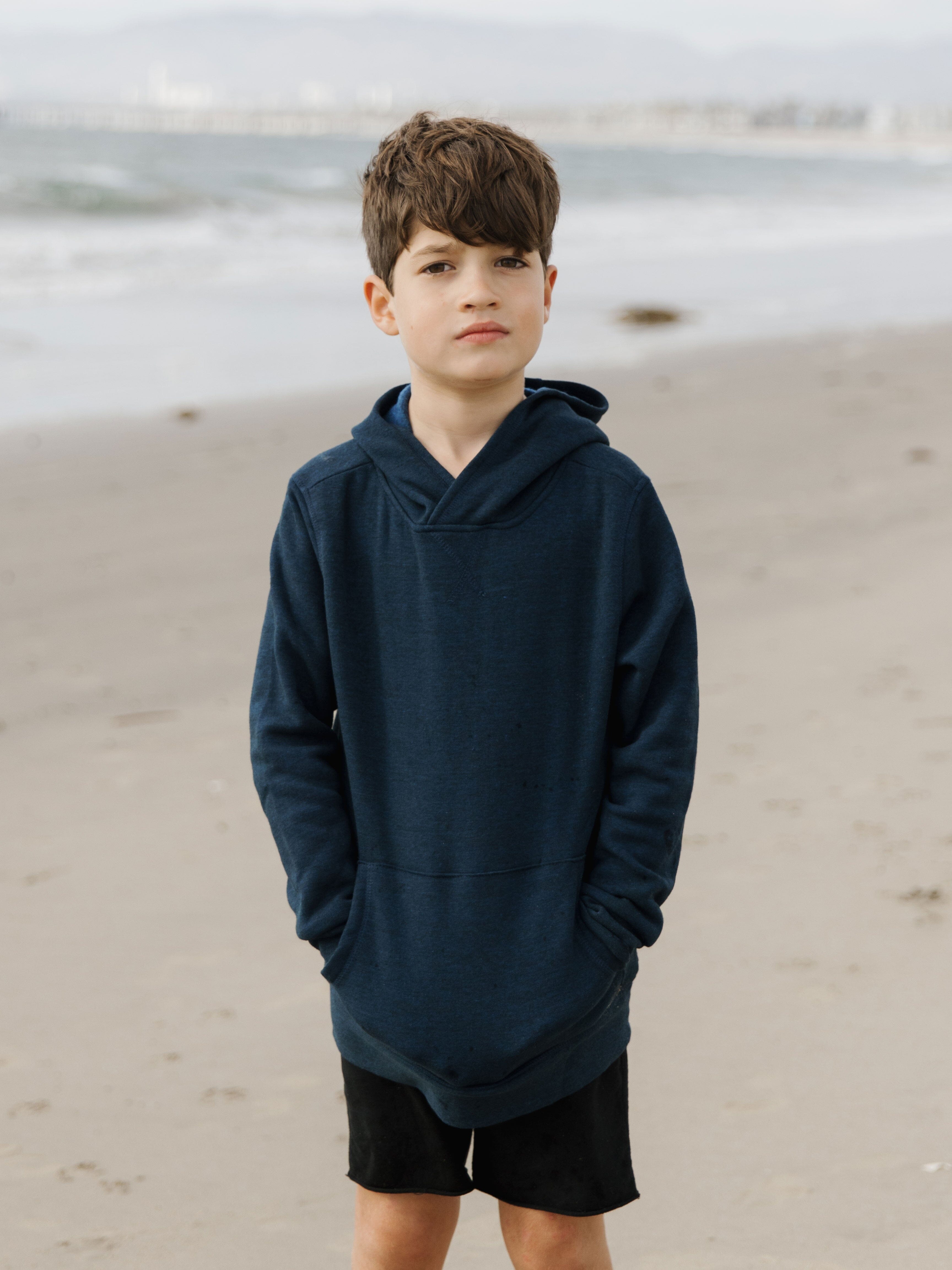 Kid's navy blue triblend pullover hoodie in a soft fleece fabric