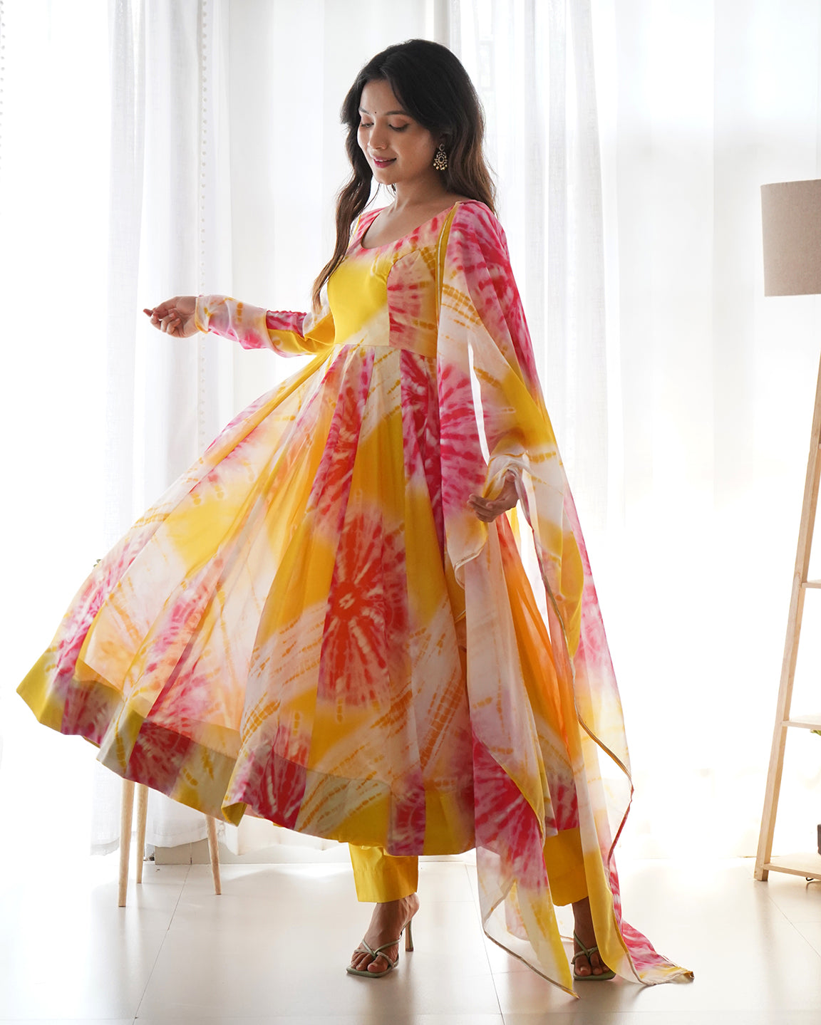 Yellow floral print organza silk Anarkali set with 4m flair and Kali-cut design
