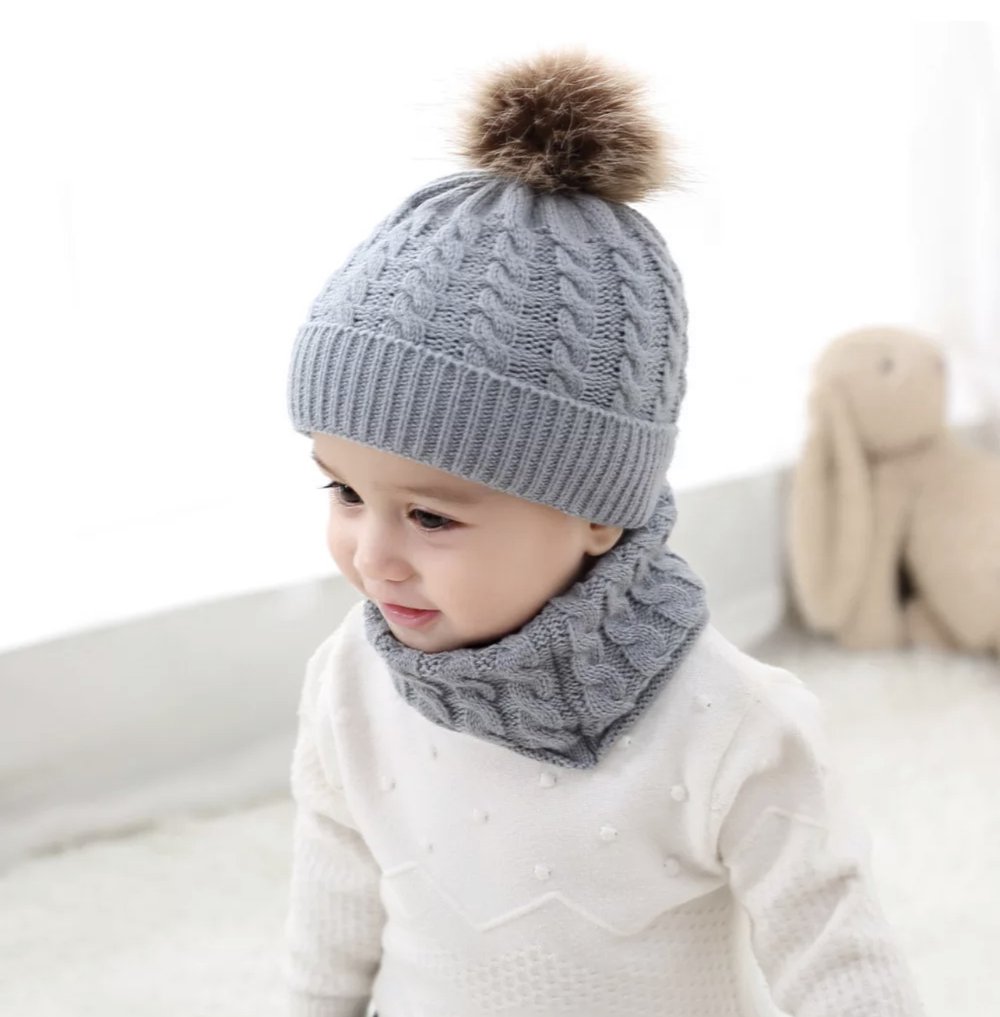 Hand-knitted beanie and neck wrap set