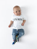 Child wearing a Little Bestie graphic t-shirt with a soft, lived-in texture