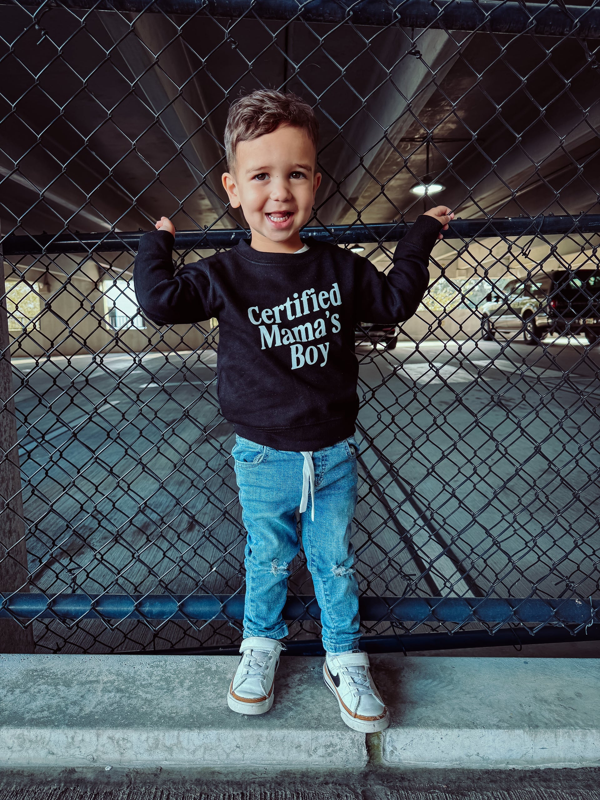 Minimalist Certified Mama's Boy pullover for kids in black and white