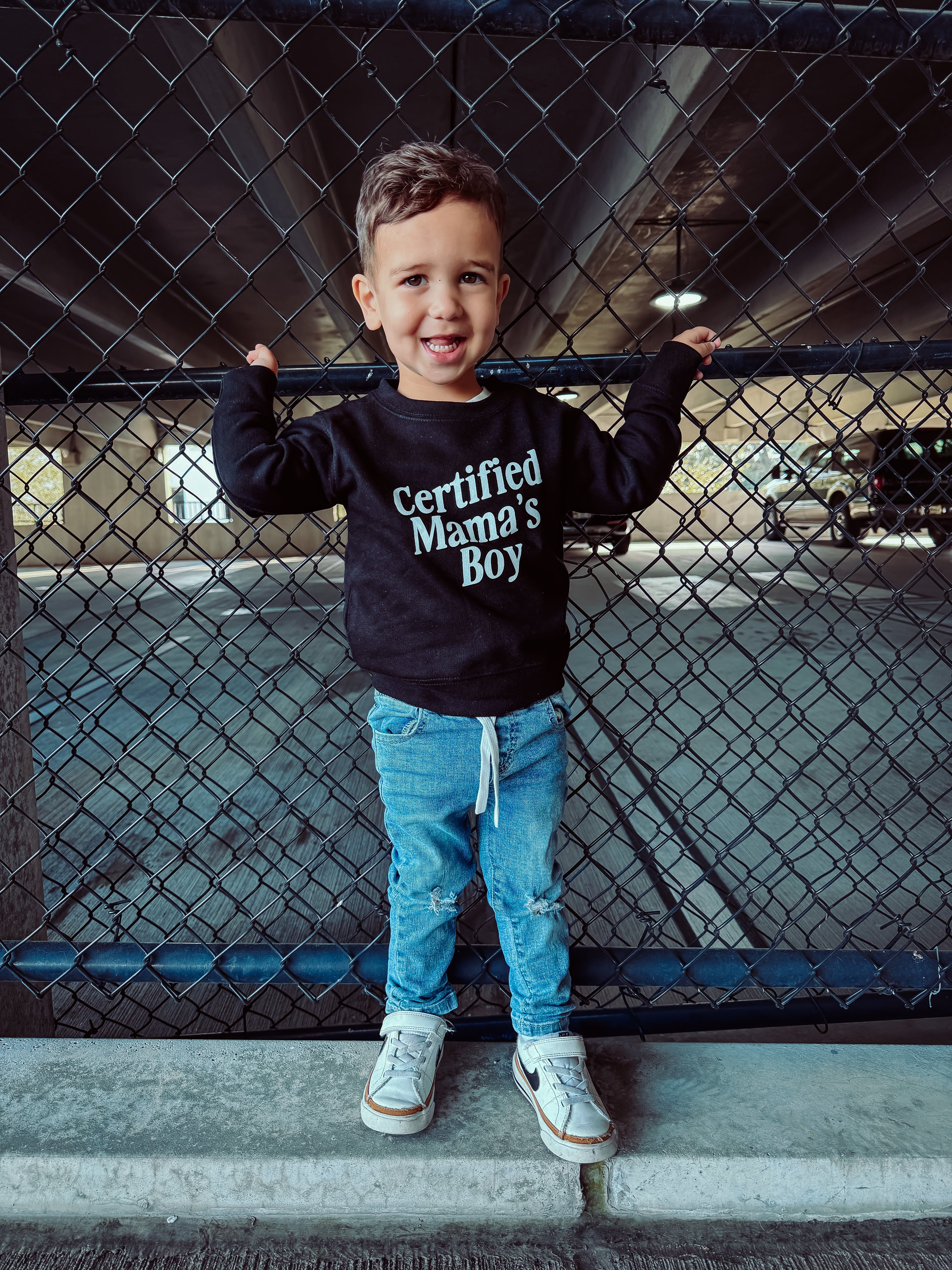 Minimalist Certified Mama's Boy pullover for kids in black and white