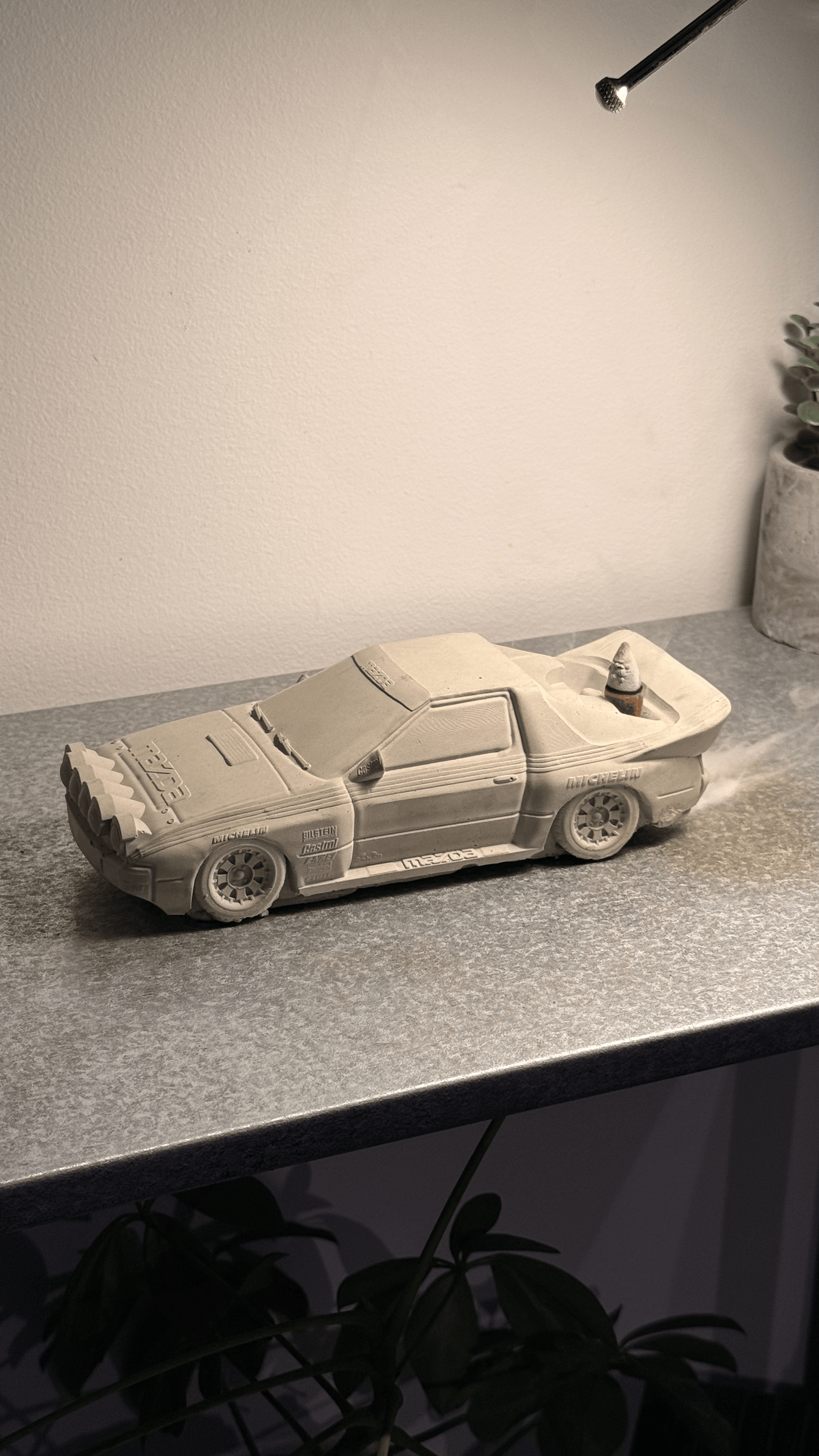 Grey concrete Rally RX-7 backflow incense burner with exhaust pipe design