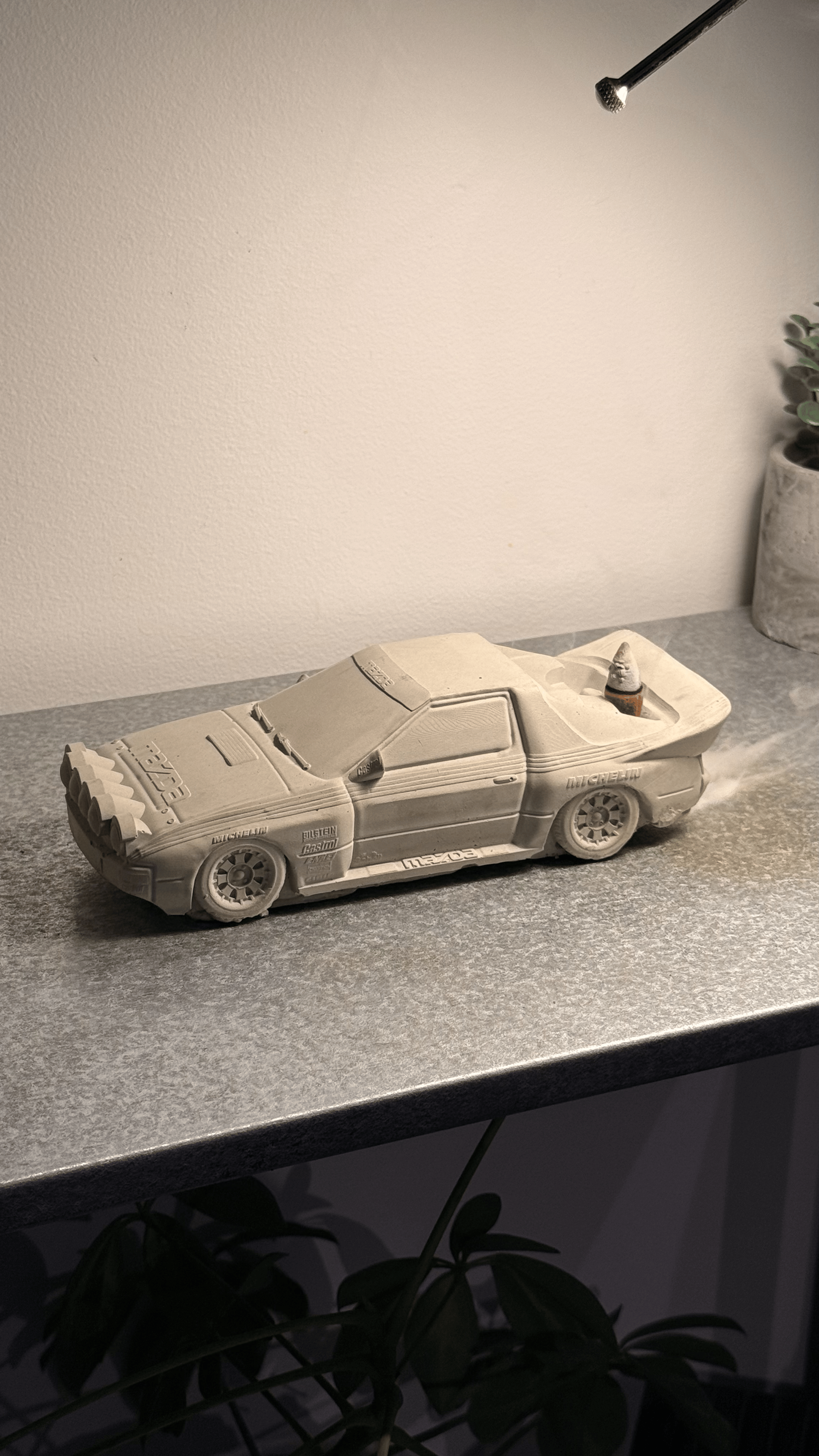 Grey concrete Rally RX-7 backflow incense burner with exhaust pipe design