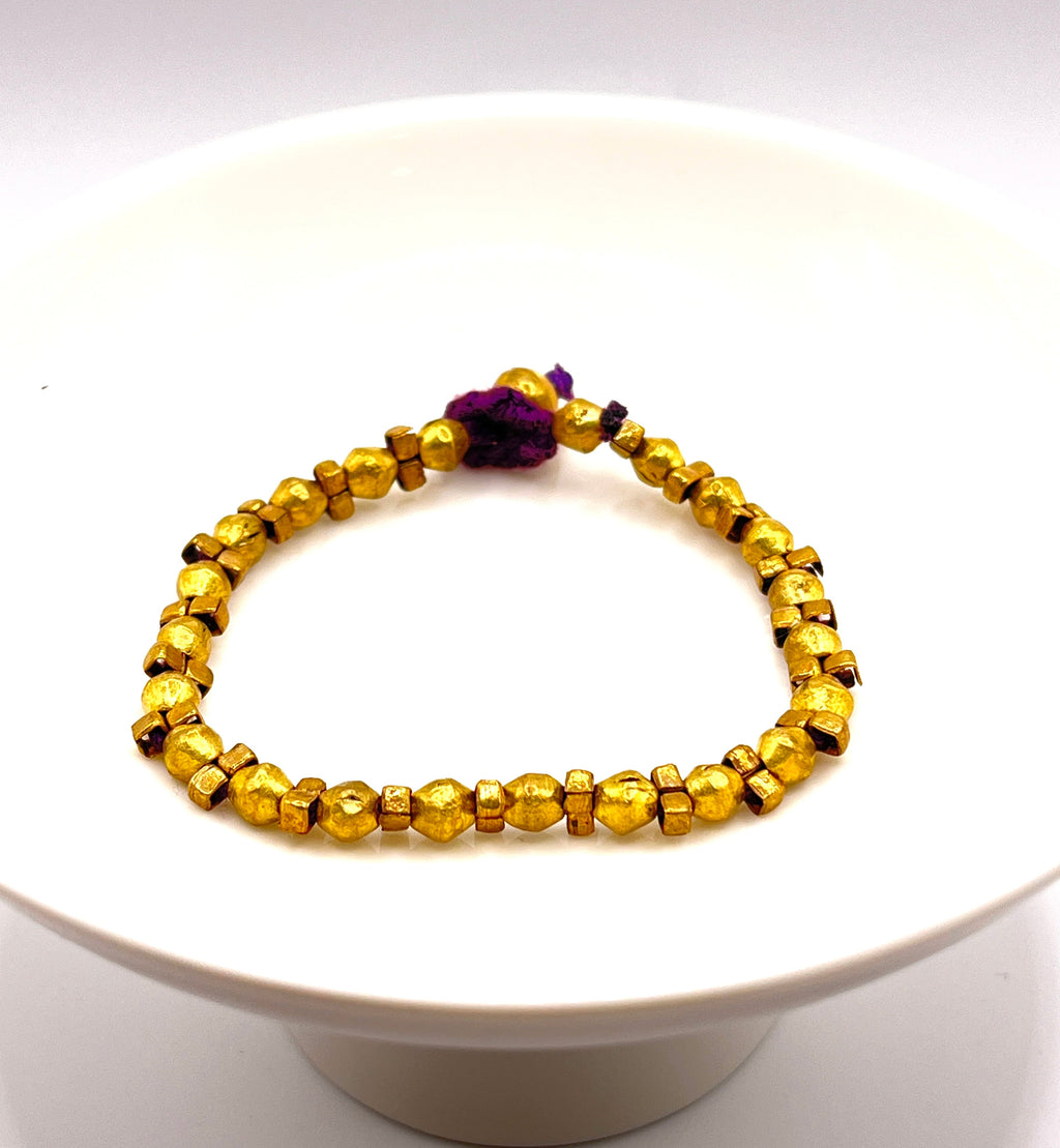 Nefassilk Bohemian Brass Bead Bracelet with Purple Cord Accent