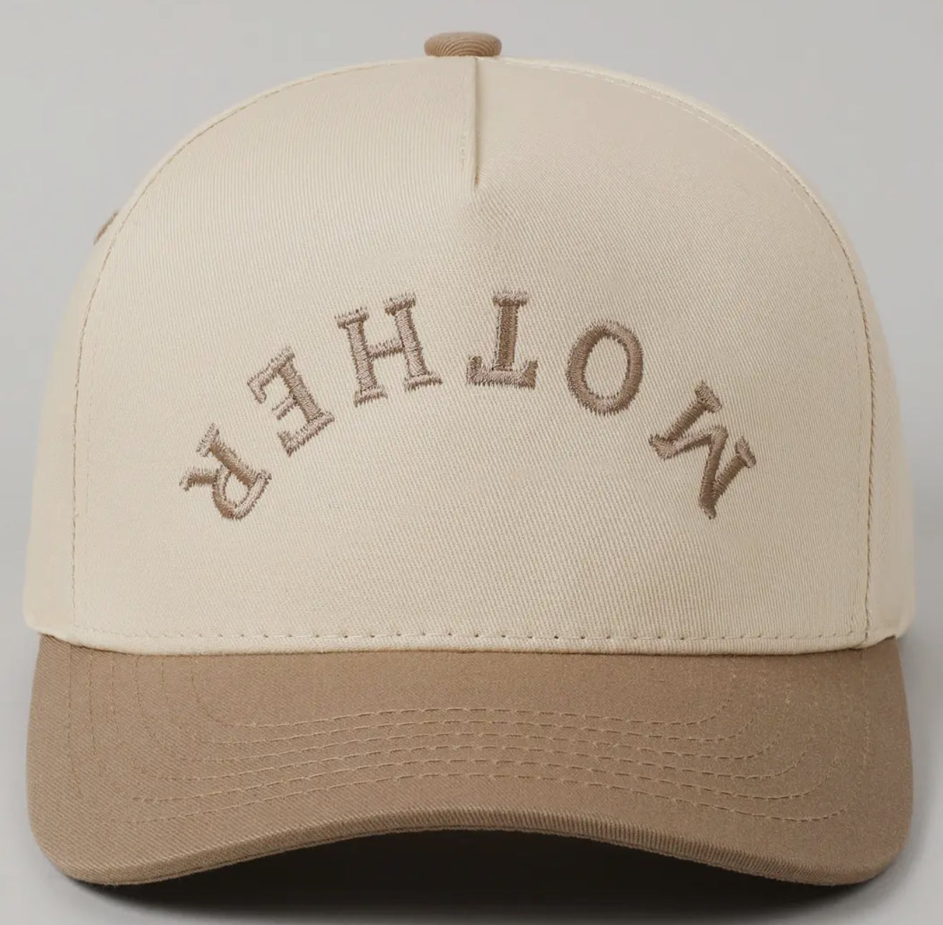Unisex 5-panel cream and brown trucker hat with upside down Mother embroidery