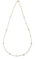 32 inch gold-tone chain necklace with white freshwater baroque pearls and a toggle clasp