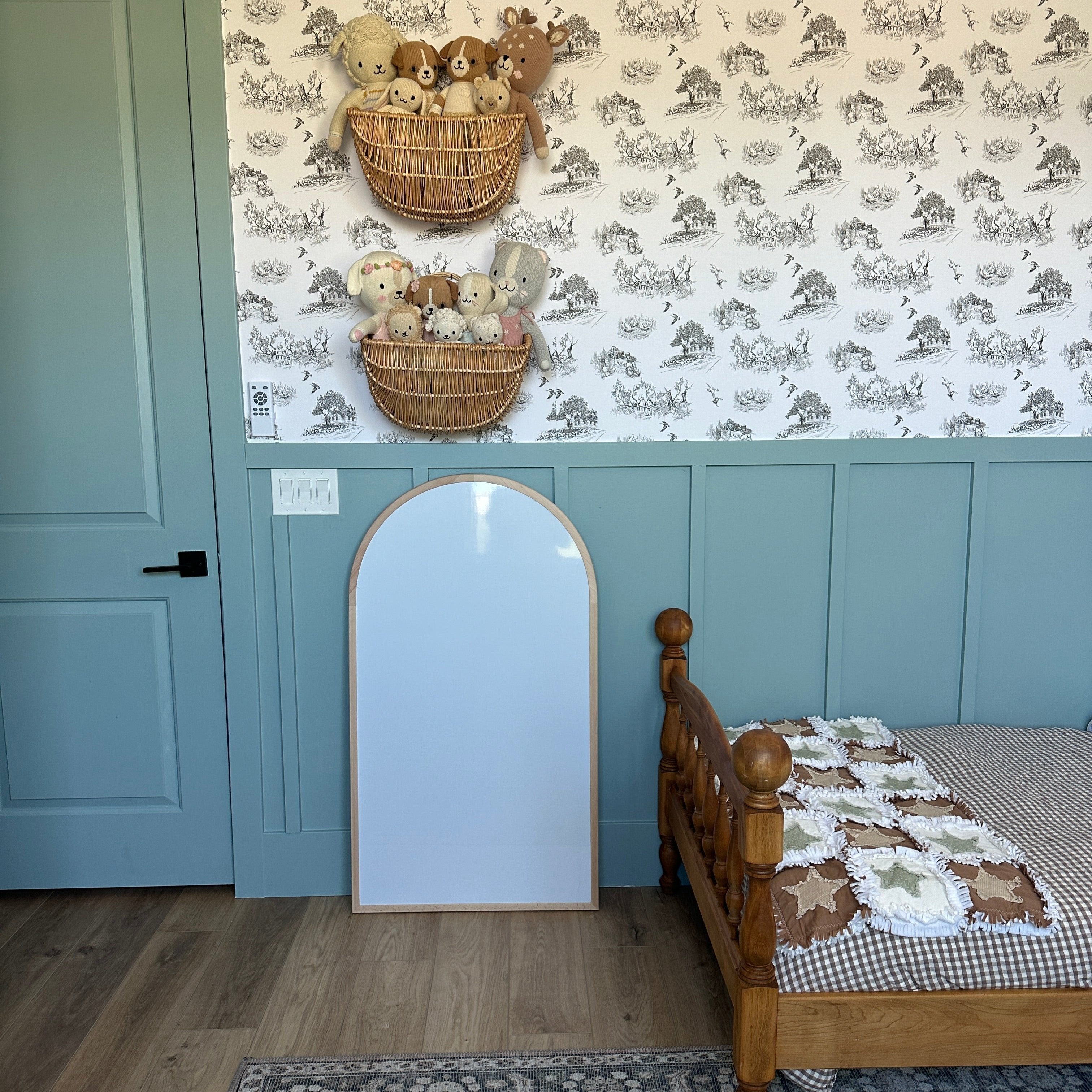 Ingalls wallpaper in white and charcoal-gray with a traditional cottagecore pattern