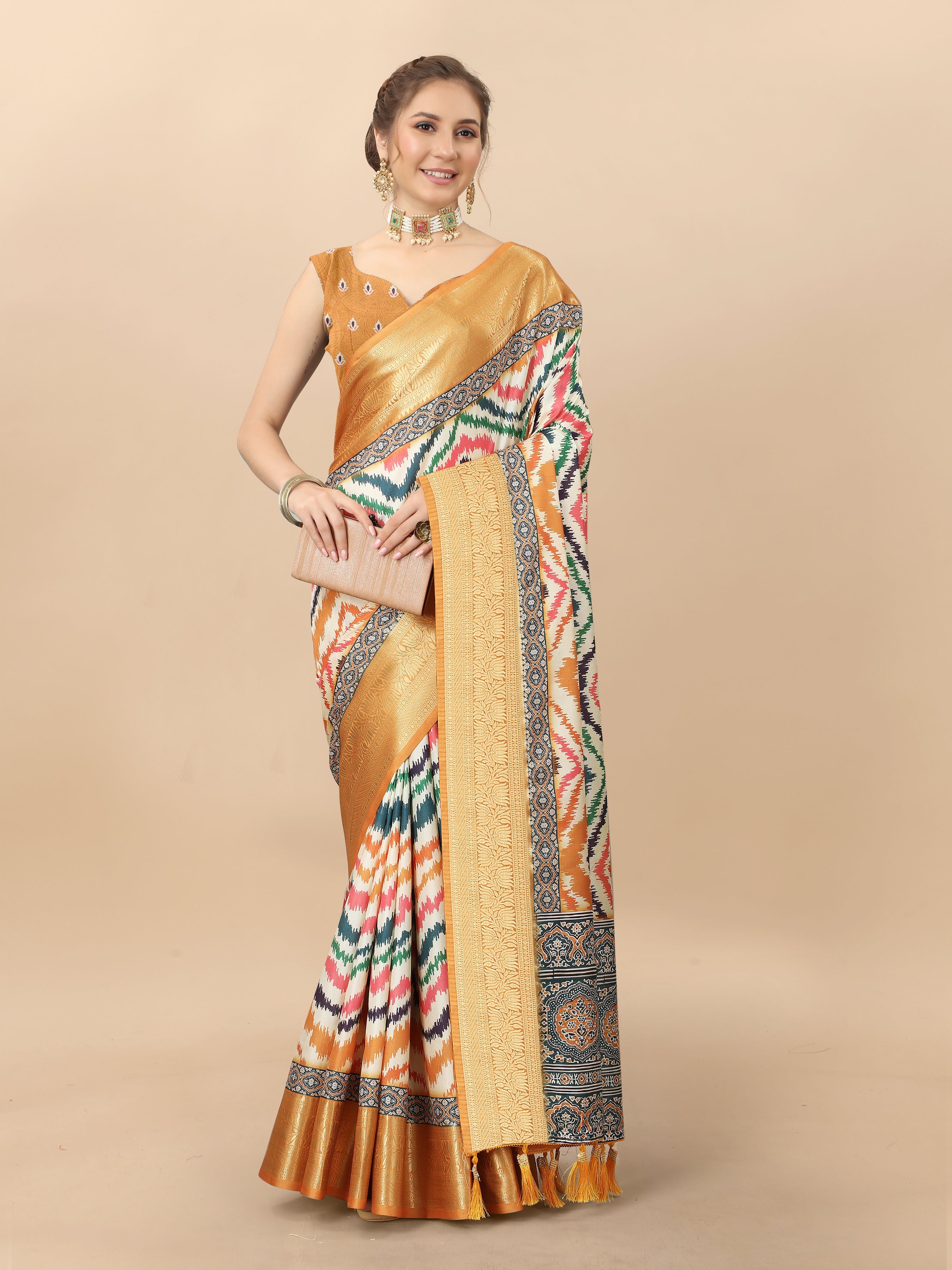 Multicolor zigzag print silk saree with gold zari border and matching blouse