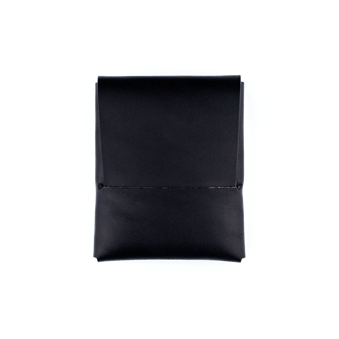 Black minimalist wallet made from a single piece of full-grain leather