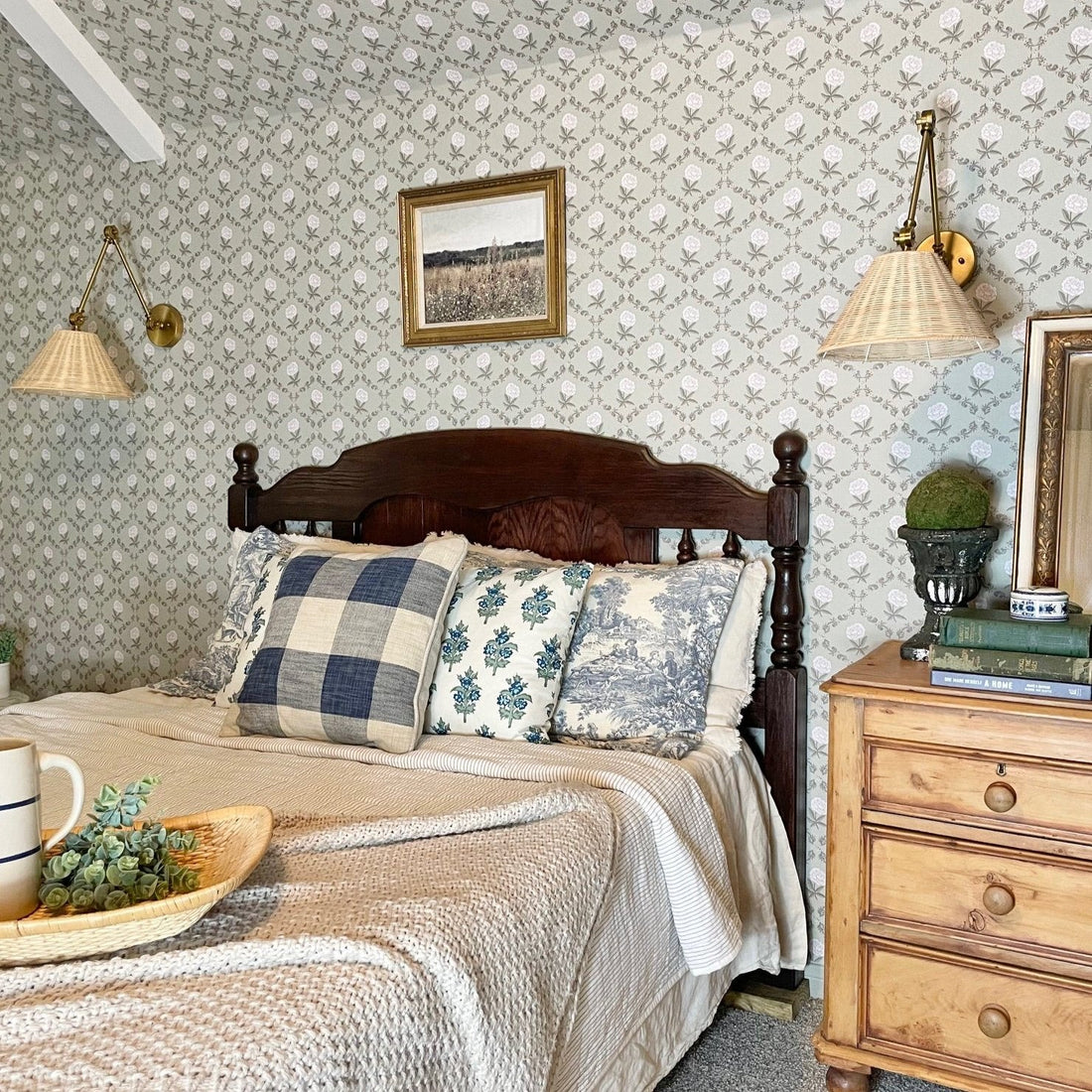 Elise floral wallpaper featuring navy blue, sage green, and dusty pink flowers