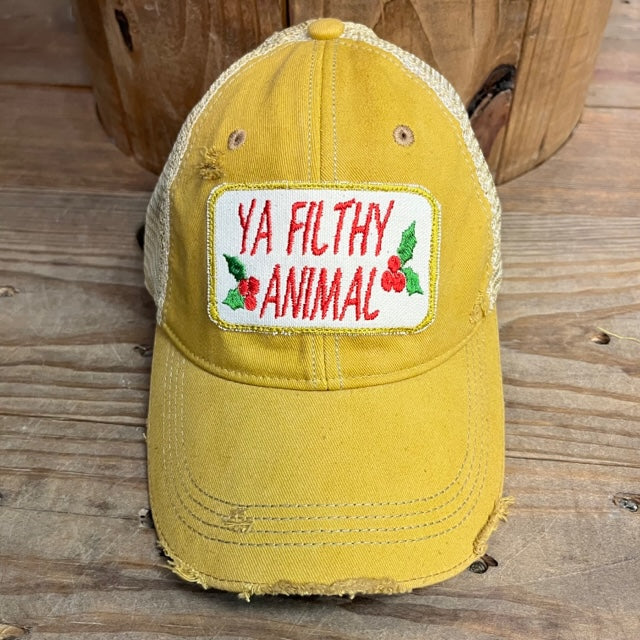 Mustard yellow distressed trucker hat with Ya Filthy Animal embroidered patch and tan mesh back.