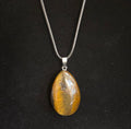 Grounded Elegance: Natural Tiger Eye Leather Pendant Necklace on Leather Rope