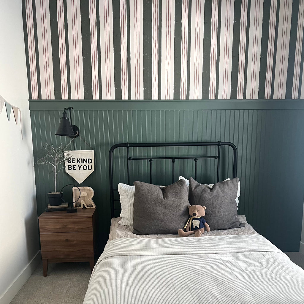 Lodge pattern wallpaper by Cassandra Zaniboni applied to a wall in a modern living space