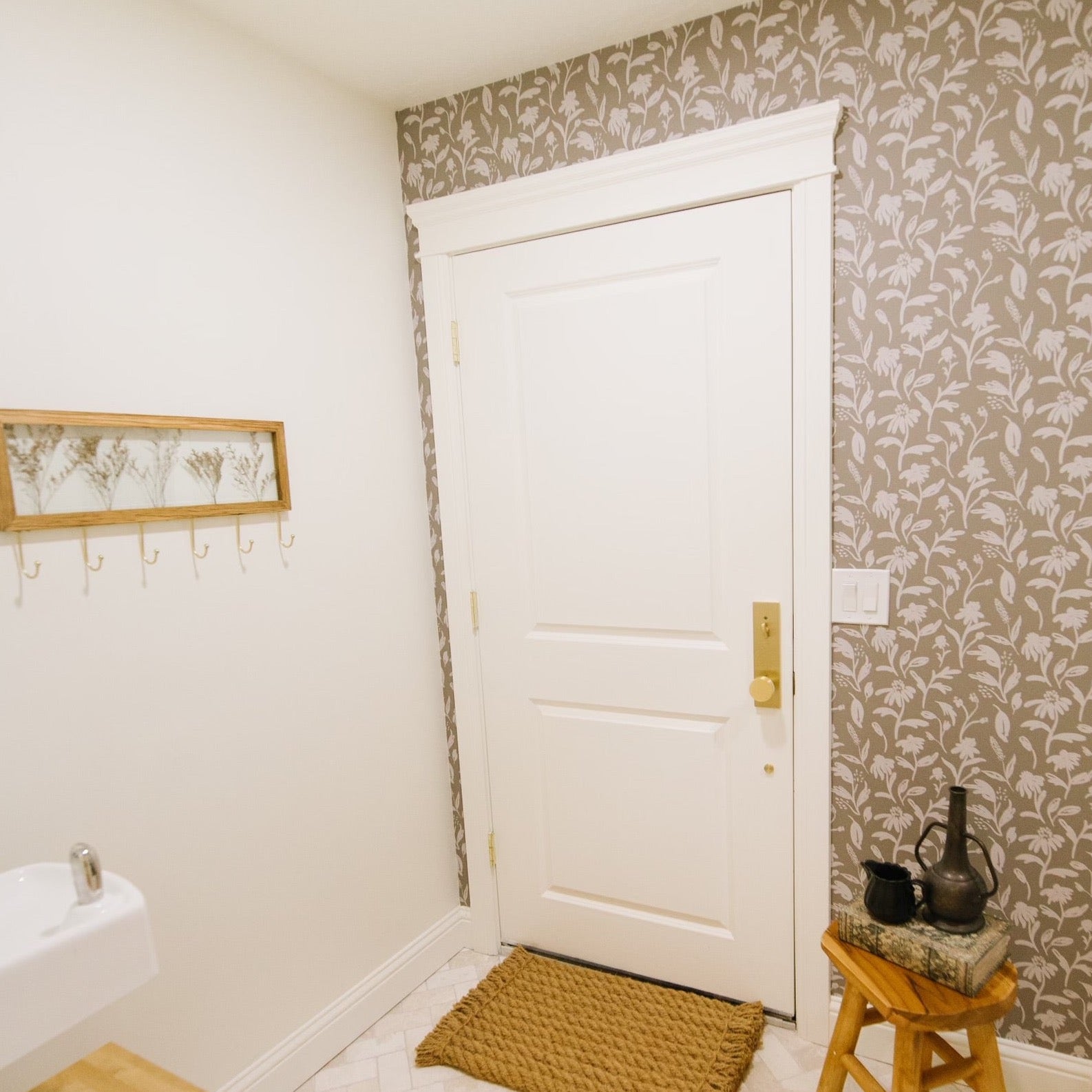 Margot floral wallpaper featuring sage green, mint green, and white botanical print.
