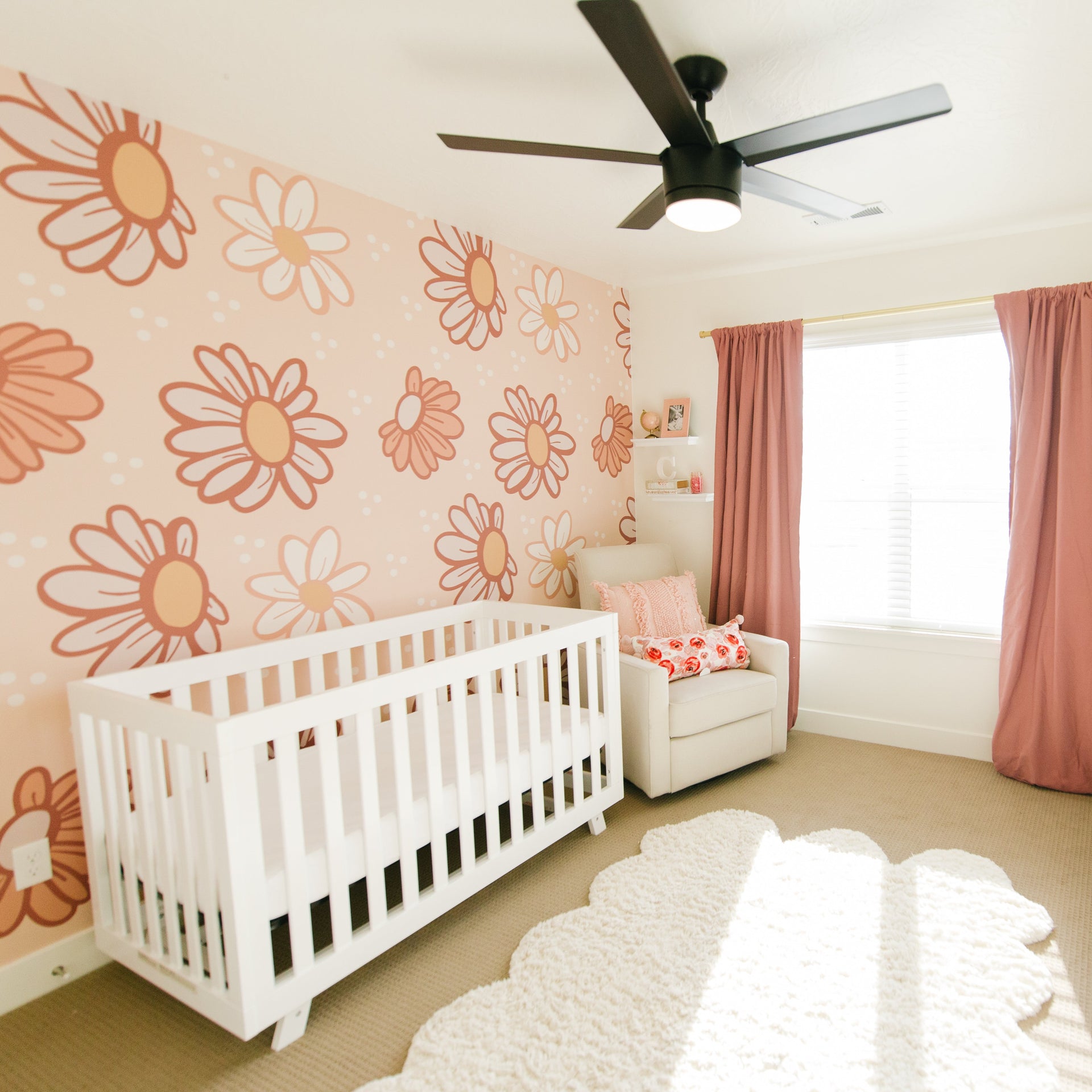 Haley floral nursery wallpaper in pink, peach, and cream