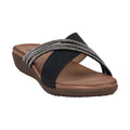 A pair of black asymmetrical flat sandals featuring sparkling embellished crisscross straps on a cushioned footbed.