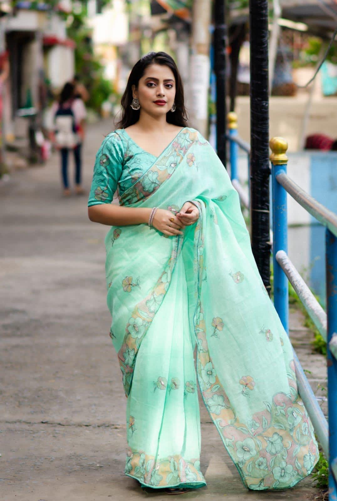 SeaGreen pure linen ethnic saree with pencil stitch embroidery and matching phantom silk blouse