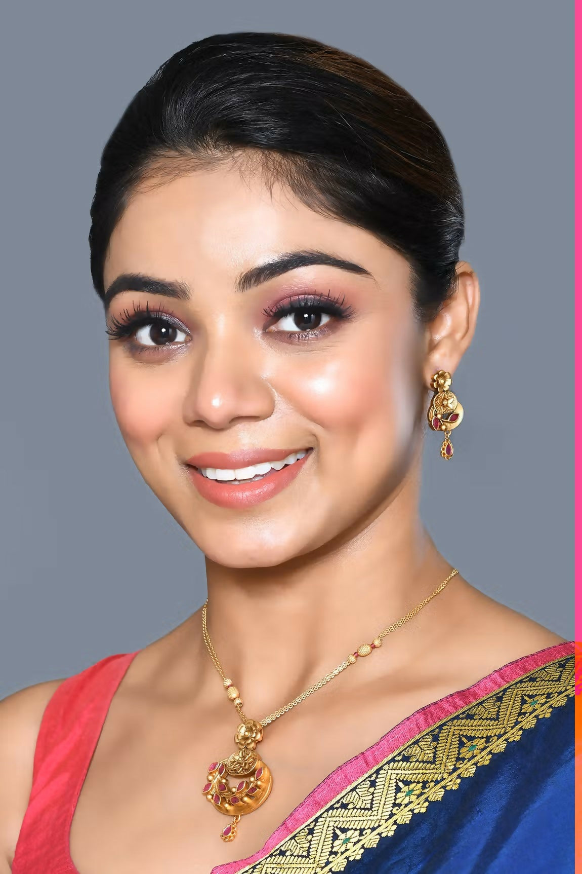 Golden Ruby pendant necklace set with earrings, featuring Jadau Kundan and pearl embellishments.