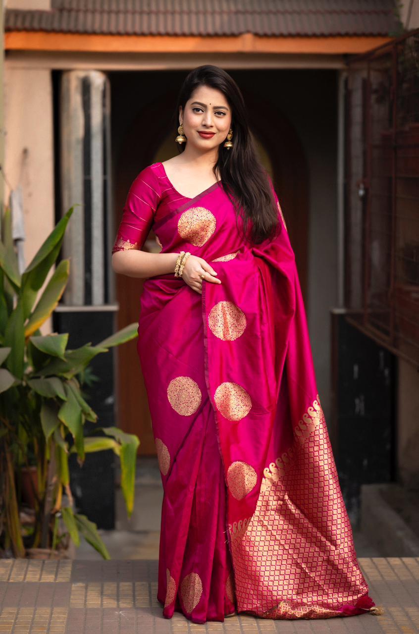 Rani pink silk woven saree with gold zari butta detailing and unstitched blouse