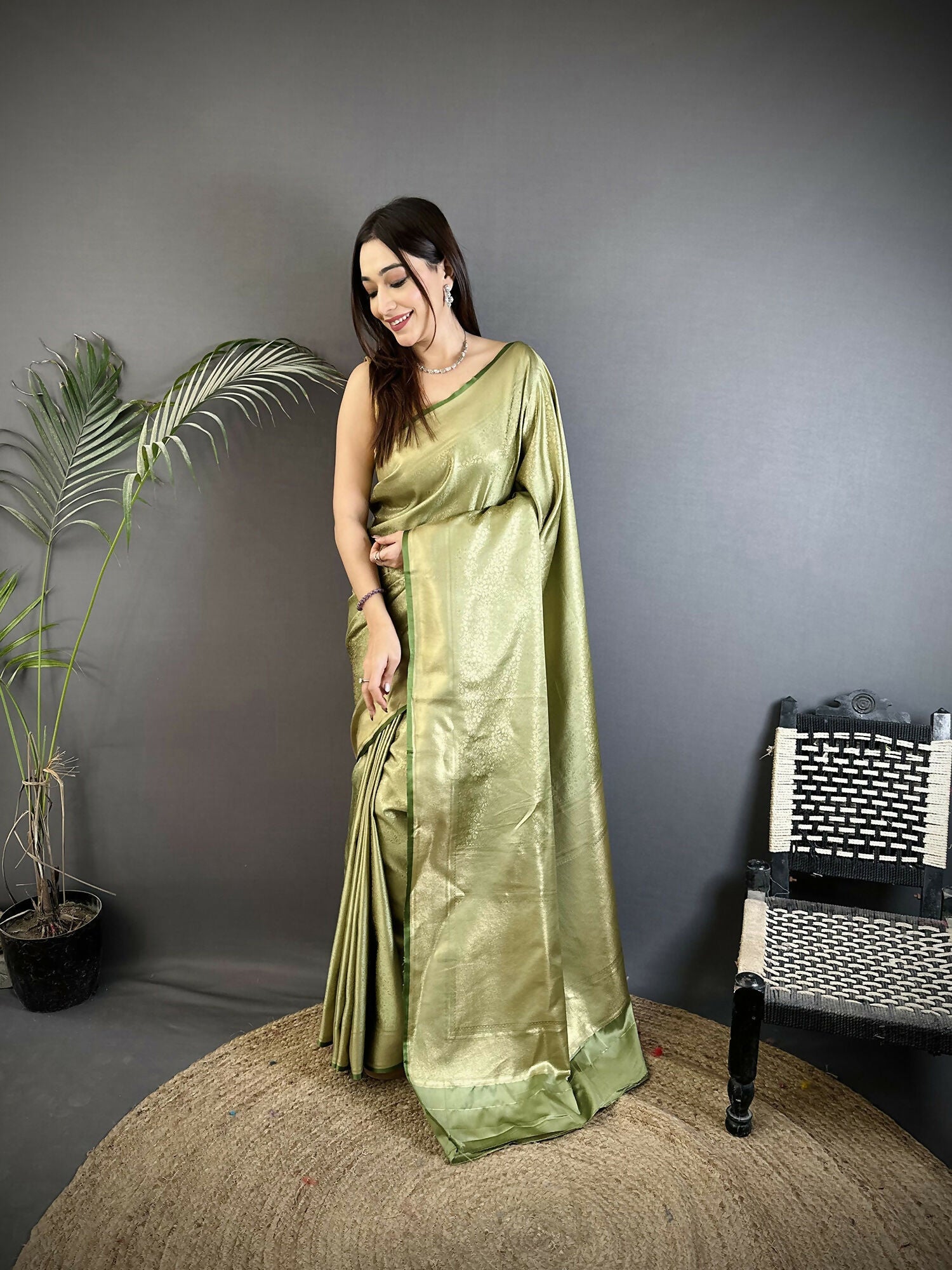 Sage Green soft satin silk Kanchipuram style saree with ethnic floral designs