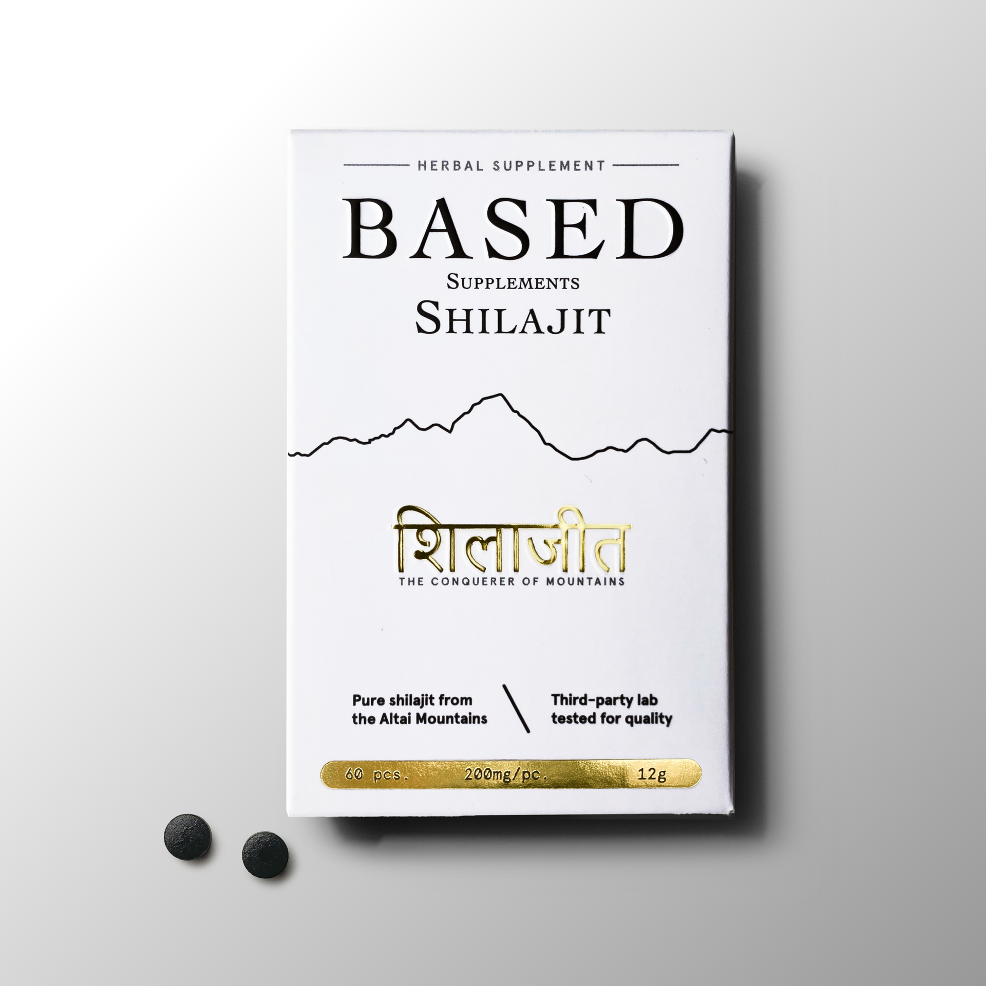 White box of Based Supplements Shilajit tablets with gold text and two tablets on a white background