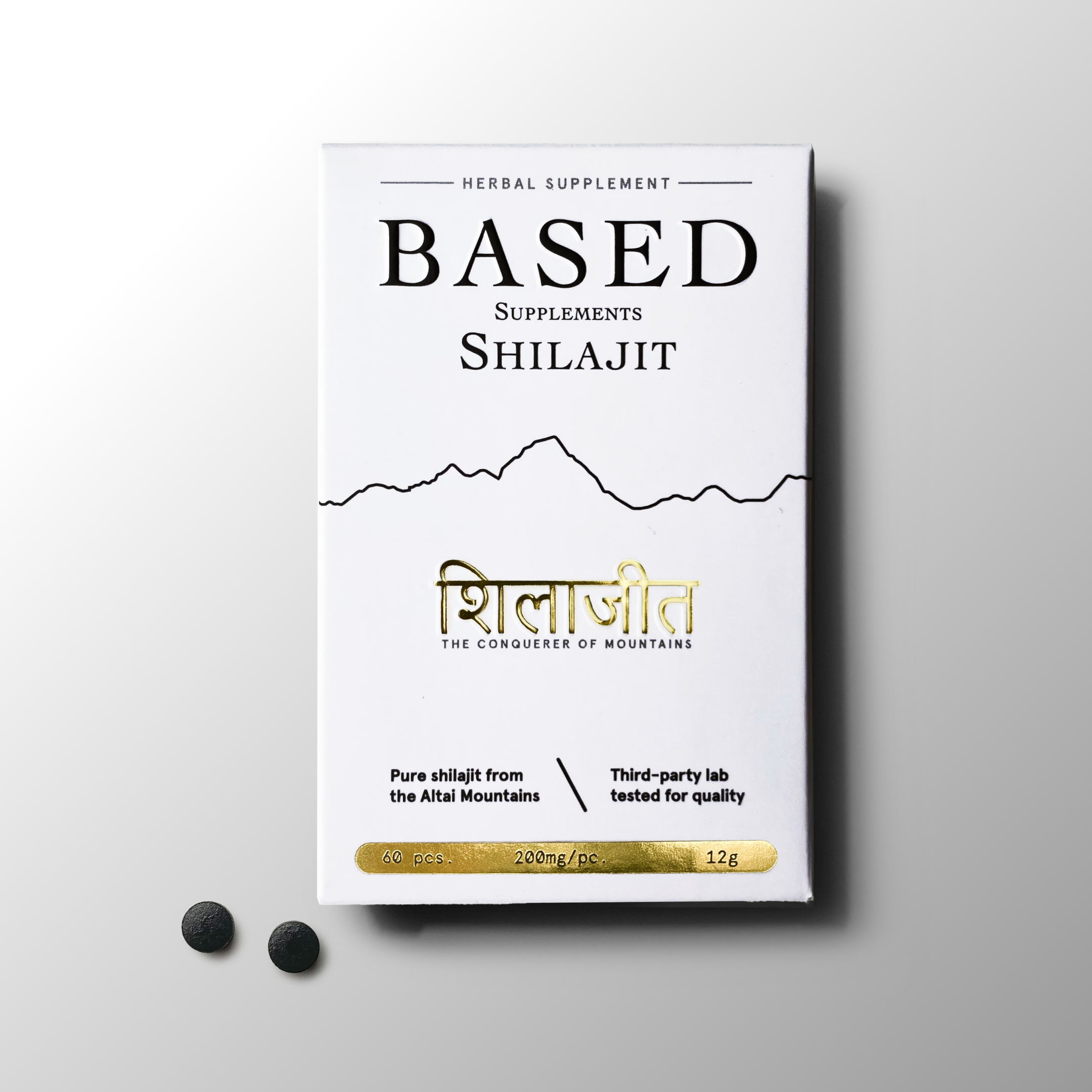 White box of Based Supplements Shilajit tablets with gold text and two tablets on a white background