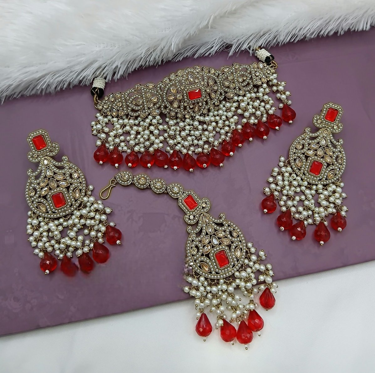 Vibrant red alloy choker necklace set designed for a sophisticated and elegant ethnic look.