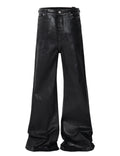 Model wearing black Wideboy Waxed Flare Denim jeans with a flared leg fit and waxed coating finish