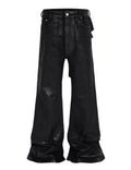 Front view of black Wideboy Patchwork Waxed Denim jeans with a wide leg flared fit.