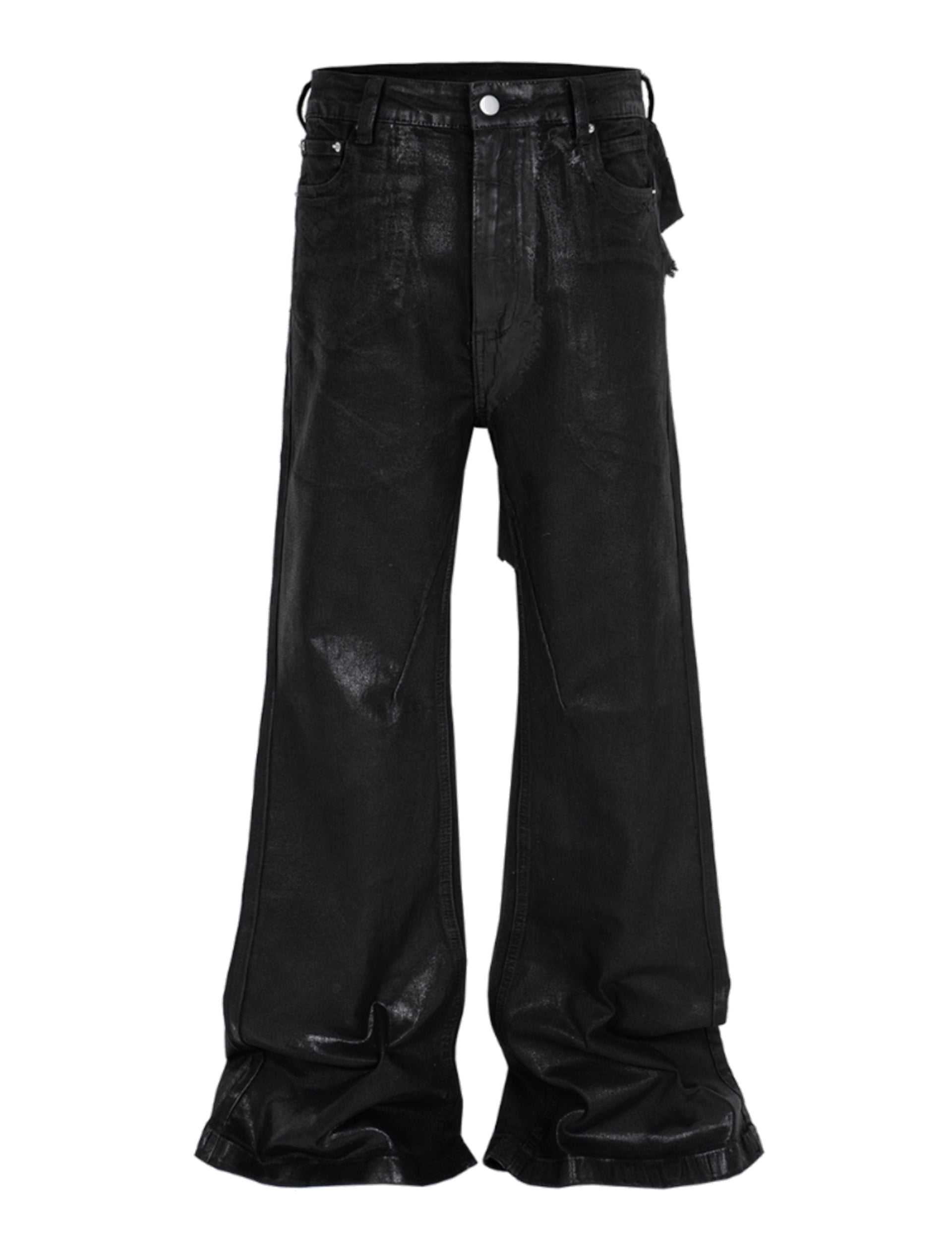 Front view of black Wideboy Patchwork Waxed Denim jeans with a wide leg flared fit.