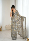 Sophisticated grey moss satin printed saree with a smooth drape