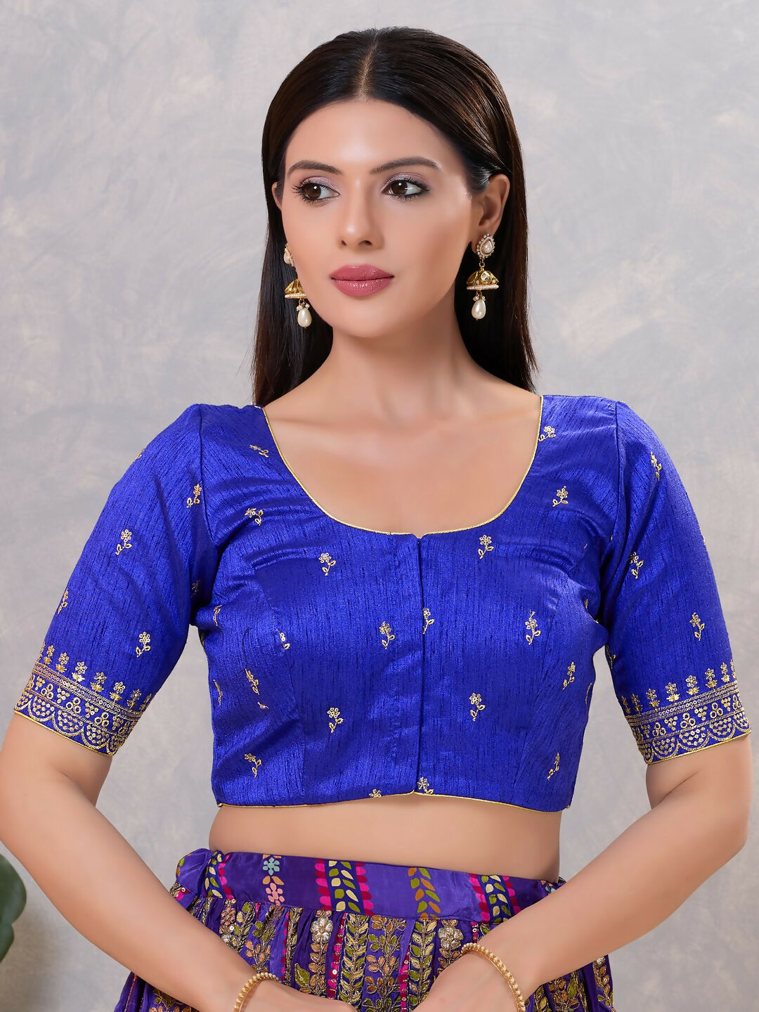 Royal-Blue silk blouse in a minimalist, non-embroidered style