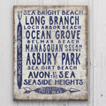 Vintage-style Jersey Shore beach sign pointing to Asbury Park, Sea Girt, Manasquan, and Seaside Heights