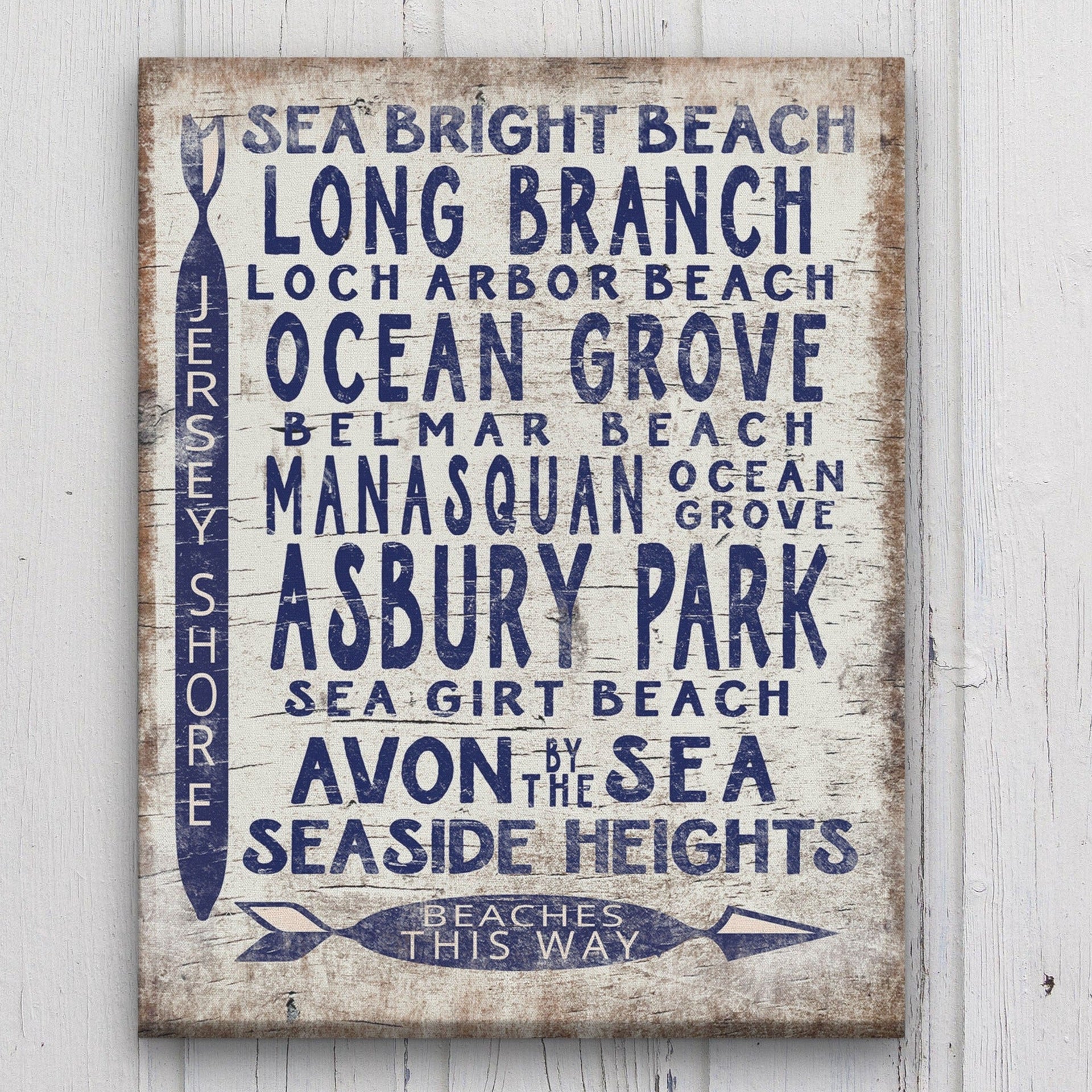 Vintage-style Jersey Shore beach sign pointing to Asbury Park, Sea Girt, Manasquan, and Seaside Heights
