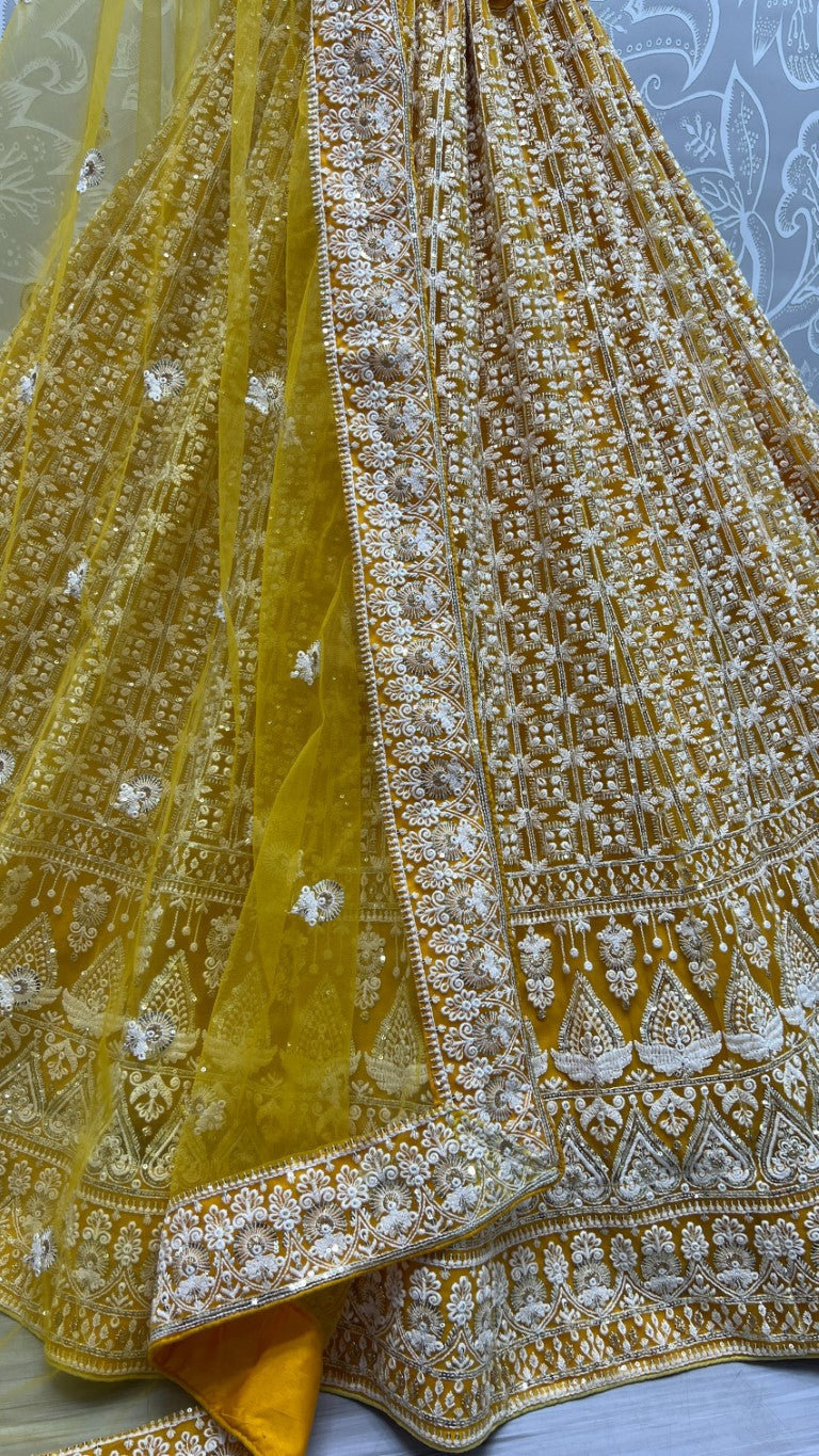 Yellow Bridal Net Lehenga Choli with Sequins and Multi Thread Work