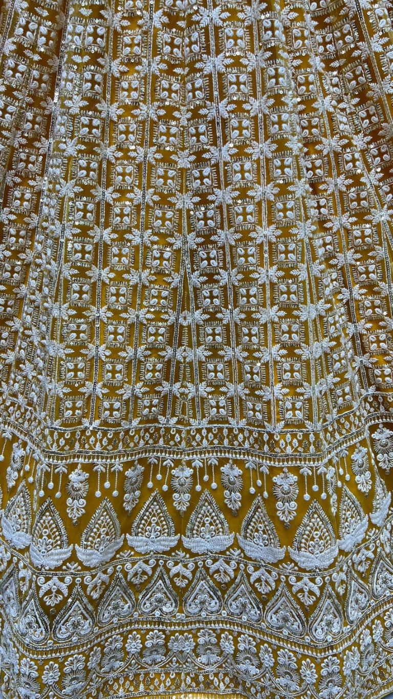 Yellow Bridal Net Lehenga Choli with Sequins and Multi Thread Work