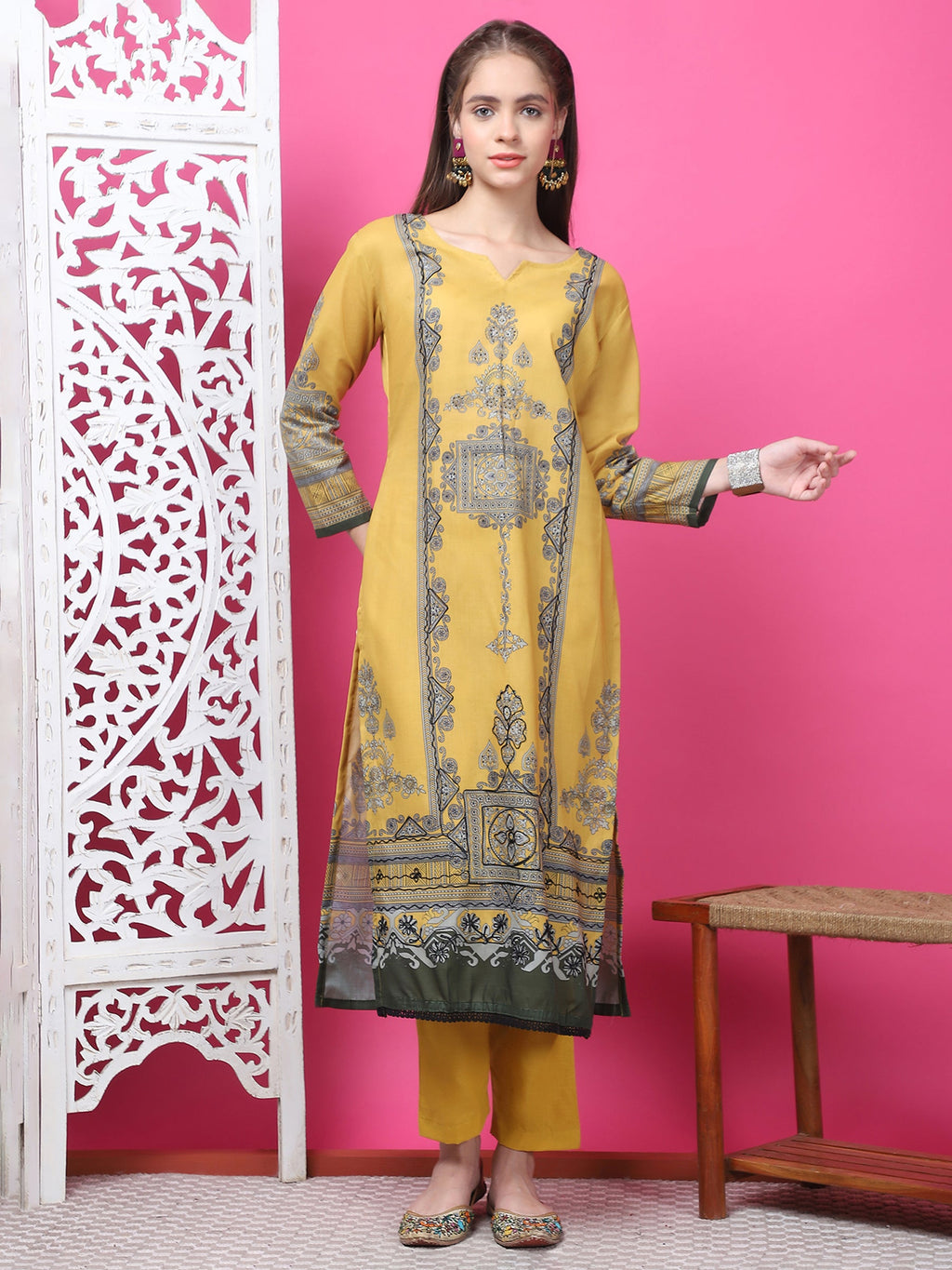 Mustard geometric print cotton kurta with zari and crystal work, paired with trousers and dupatta