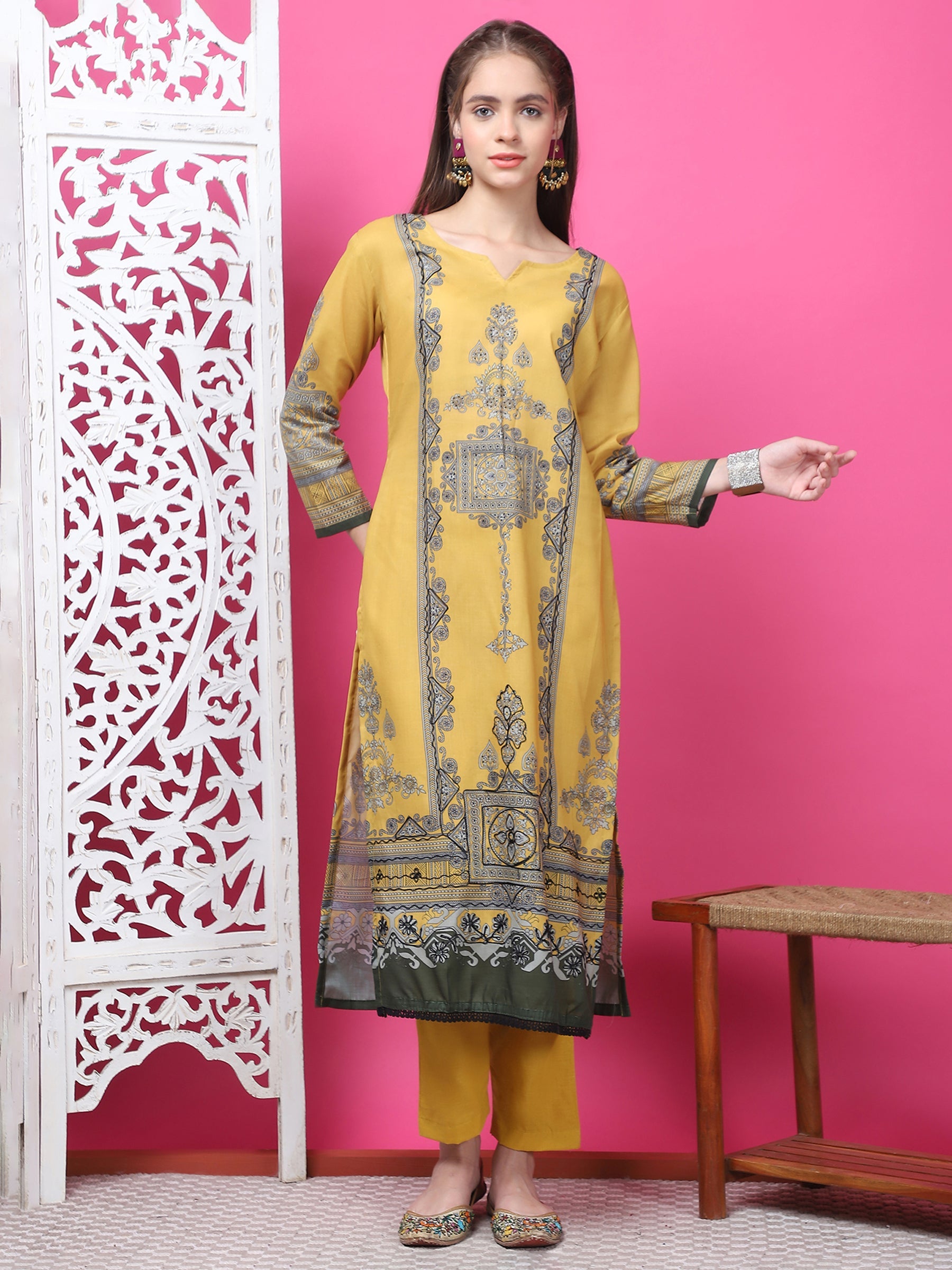Mustard geometric print cotton kurta with zari and crystal work, paired with trousers and dupatta