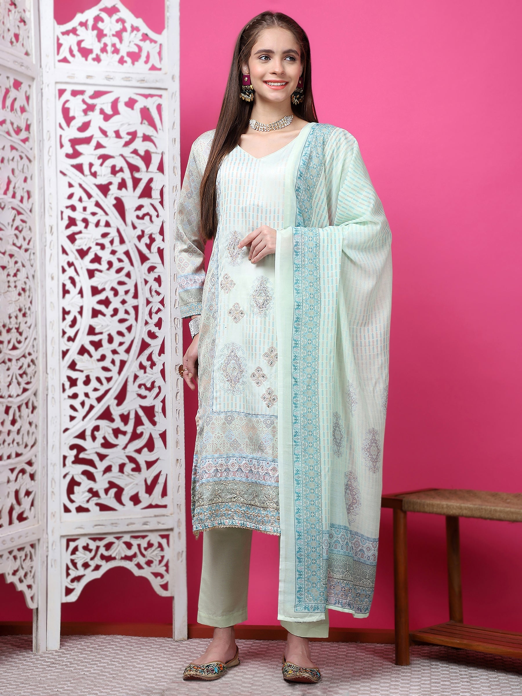 Pista green straight cotton kurta with geometric print and crystal embellishments and matching trousers
